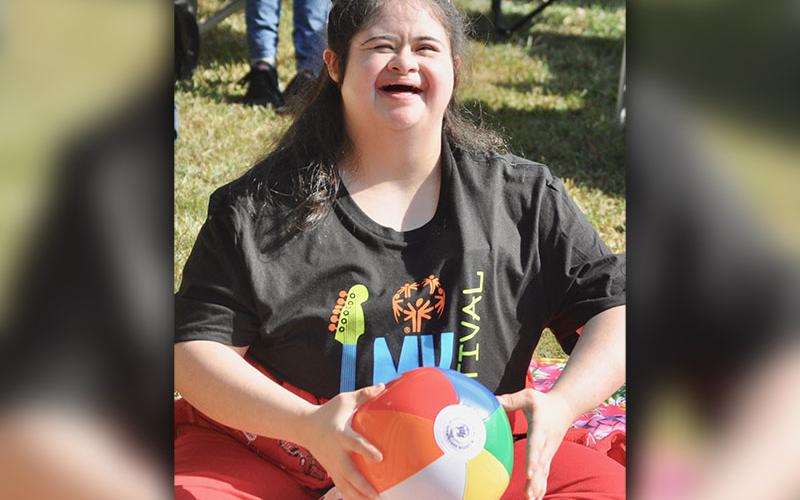 Special Olympics athlete Christina Leon was all smiles as she swayed to the music  during the 2019 Fannin County Special Olympics Music Festival. The event kicked off the Special Olympics year and was located at the downtown Blue Ridge park.