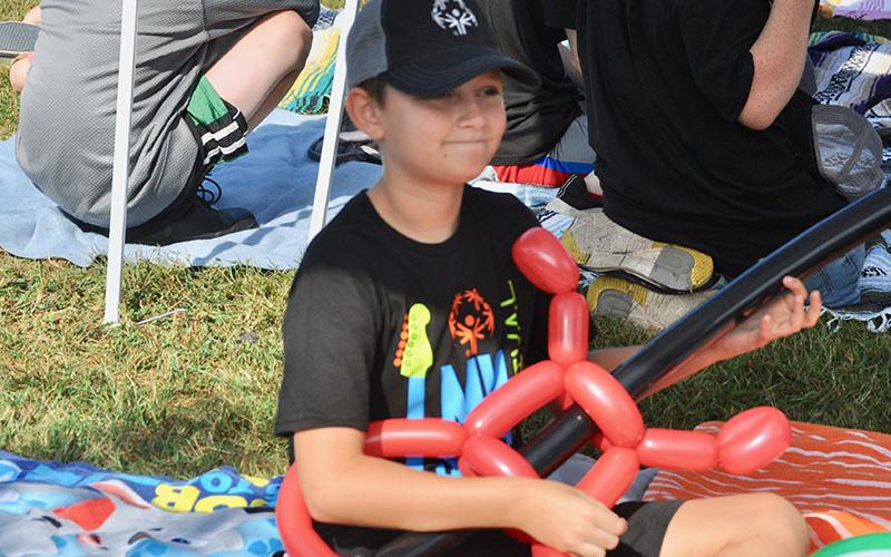 Special Olympics athlete Maddix Tranthem strummed his balloon guitar to the music at the 2019 Fannin County Special Olympics Music Festival.