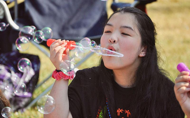 Hollie Bruggemeir blew bubbles with her friends at the 2019 Fannin County Special Olympics Music Festival.