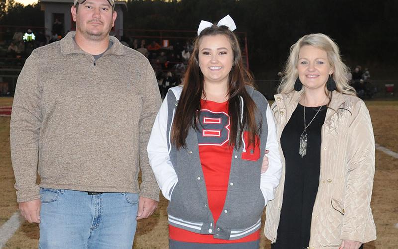 Senior Cheeleader Alexandria Hook was honored at Copper Basin’s senior night Friday, November 1. Hook is shown with her parents Jason and Courtney Hook.