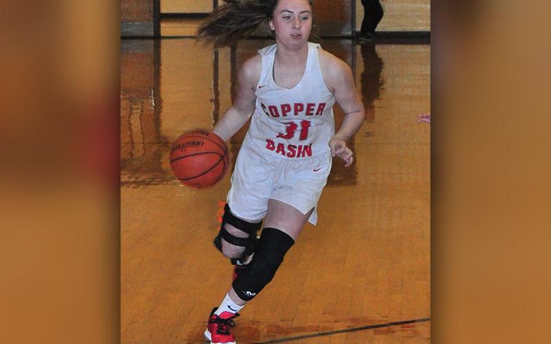 Lady Cougar Laney Jory uses her speed to get around a Nantahala defender during Copper Basin’s win over the Lady Hawks Thursday, November 21.