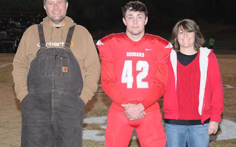 Senior Chance Bailey was honored at Copper Basin’s senior night before the South Pittsburg game Friday, November 1. Bailey is shown with mother Amanda Bailey and Lee Dillard.
