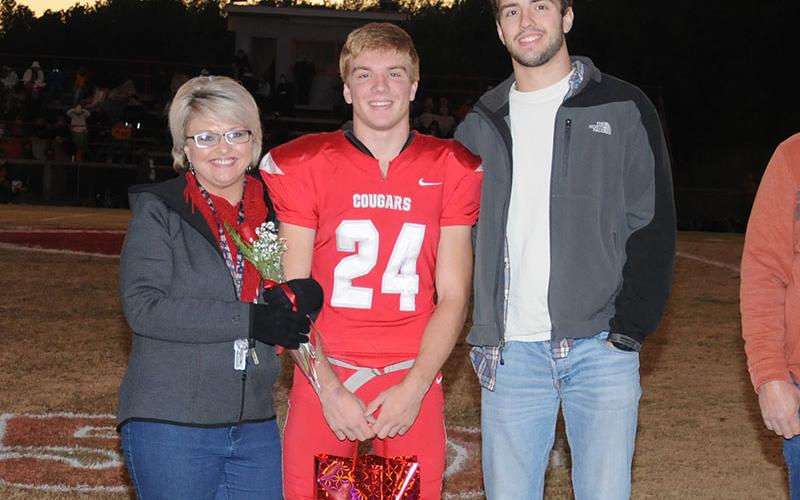 Senior Cougar Chase Mickens was honored during Copper Basin senior ceremony Friday, November 1. Mickens is shown with his mother, Sarah Mickens and brother Keaton Mickens.