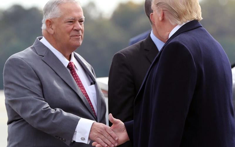 David Ralston shaking hands with President Donald Trump.