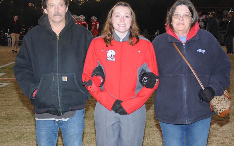 Senior bad member Destani Spiers is shown with her John Spiers and Shelly Rush. Spiers was honored at Copper Basin’s senior night Friday, November 1.