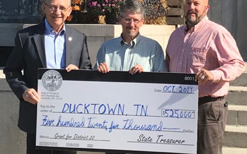 Tennessee State Representative Dan Howell, left, presented a $525,000 check for a Community Development Block Grant to Ducktown Mayor Doug Collins, center, and Polk County Executive Robby Hatcher. The money will be used to make badly needed repairs to the main water line leading from the city’s water tower, Howell said. The presentation was made in Benton Monday, October 28.