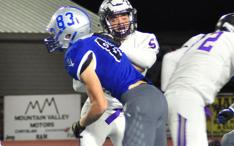 Fannin Rebel Dalton Ross (83) gets around a defender and brings pressure on the quarterback during the Rebels 35-14 win over the Lumpkin County Indians Friday, November 1.