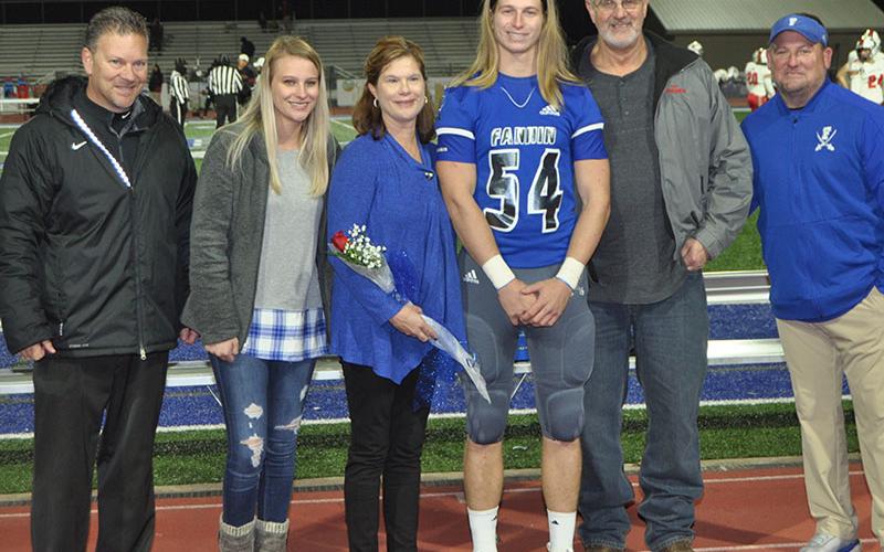 FCHS held senior night for the football players Friday, November 8, before the GAC game. Shown are, from left, Victoria Weeks, sister; Julie Weeks, mother; senior Jackson Weeks and Vernon Weeks, father.