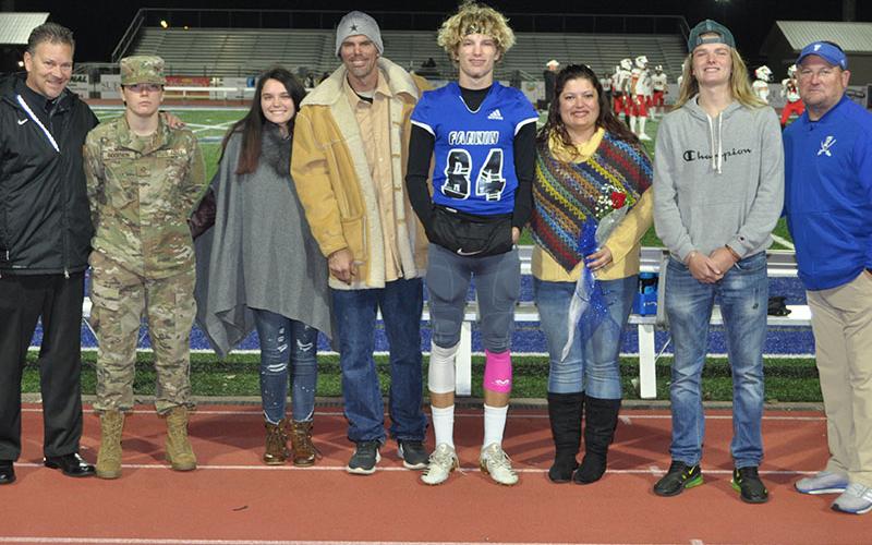 Fannin County High School senior JoJo Goodwin was one of the football seniors honored before the Rebels game against GAC Friday, November 8. Shown from left are, Alyssa Goodwin, sister, Lelaina Goodwin, sister; Robert Goodwin, father; senior JoJo Goodwin, Kelly Goodwin, mother; and Cameron Goodwin, brother.