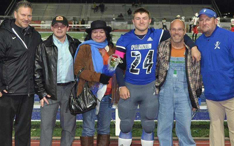 Fannin County Rebels seniors Billy Mitchely was honored before Fannin’s last home game against the GAC Spartans Friday, November 8. Mitchely is pictured with Melissa Barnett and Lee Mitchely.