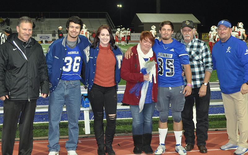 Will Mosley was one of the football seniors honored at the Rebels last home game of the season Friday, November 8. Shown are, from left, Jonah Henry, Catie Mosley, Janie Mosely, senior Will Mosley and Curtis Mosley.
