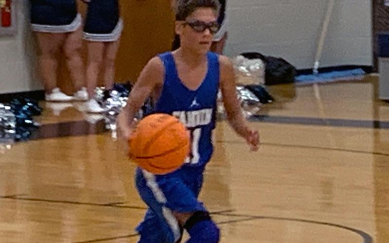 Eighth grader Benjamin Bloch brings the ball up the court during the Rebels game with White County Thirsday, November 7.