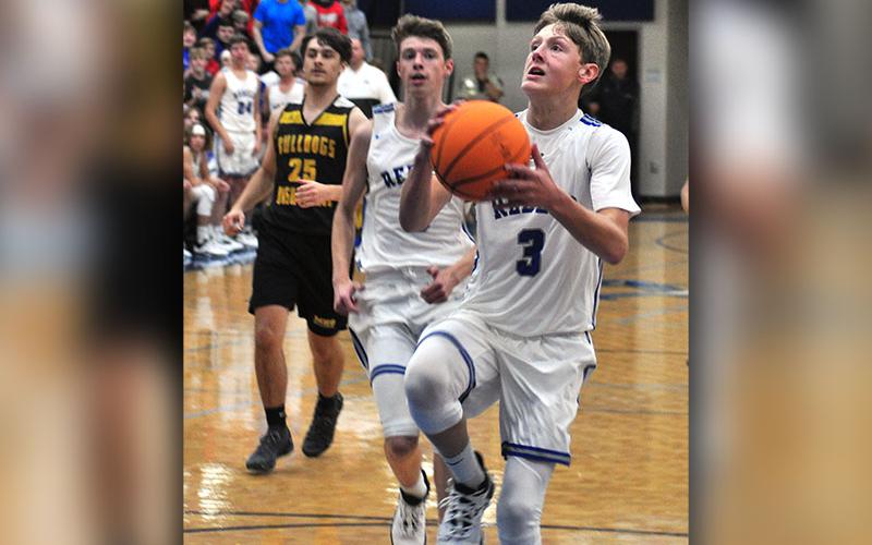 Fannin County Rebel Landon Norton goes up for a basket during Fannin’s 50-49 preseason win over Murphy Thursday, November 14.