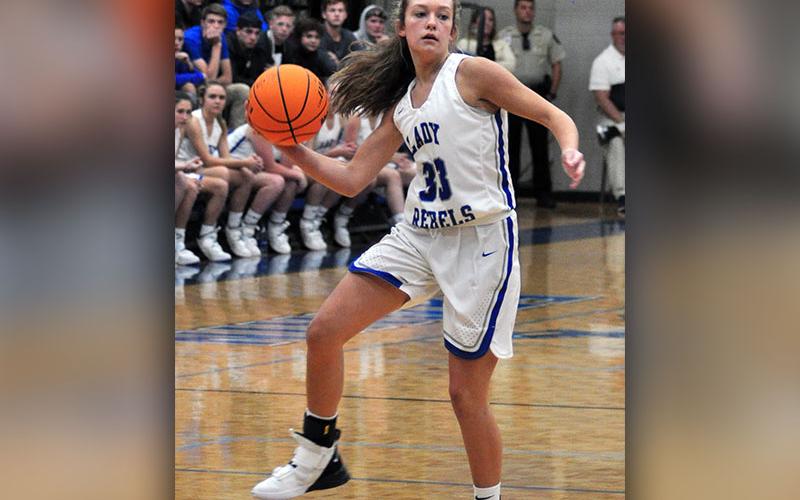 Lady Rebel Regan York passes the ball during Fannin’s preseason scrimmage with Murphy Thursday, November 14.
