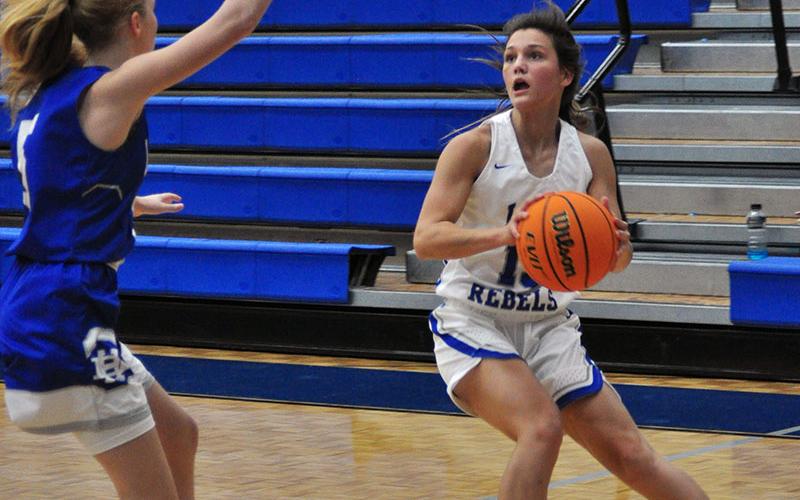 Lady Rebel Becca Ledford pulls up for jumper in recent action for the Lady Rebels basketball team.
