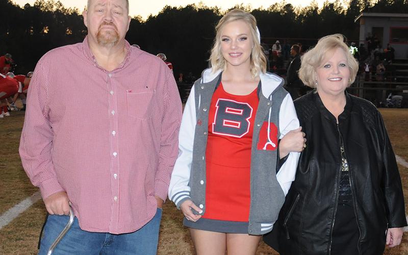 Senior Lady Cougar cheerleader Heaven Self was celebrated at Copper Basin’s senior night Friday, November 1. Self is shown with Pat and Cindy Suits.