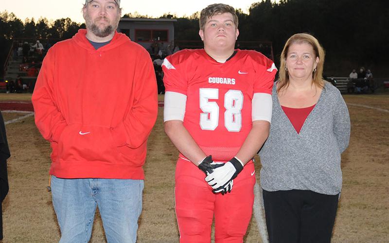 Senior Cougar Isaac Leslie was honored at Copper Basin’s senoir night Friday, November 1. Leslie is shown with his parents Freddy and Jessica Leslie.