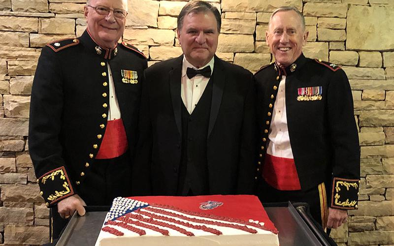 Lieutenant Colonel Dale Greene, Judge Patrick Murphy and Colonel Mike Nunnally, shown from left, stand together with the ceremonial cake celebrating the 244th Birthday Celebration of the United States Marine Corps. The Ball is the 5th Annual U.S. Marine Corps Birthday Ball put on by the Marine Corps League, Lake Blue Ridge Detachment #1438.