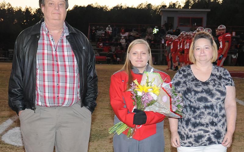 Senior Drum Major Lily Roberts was honored at Copper Basin’s senior night, Friday, November 1. Roberts is shown with Jerry and Mary Miller.