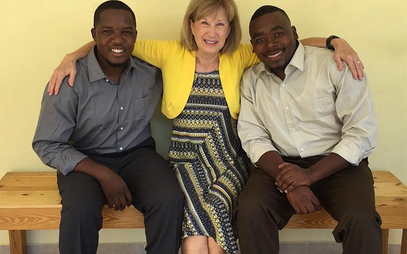 Pam Reifnsyder is shown with her “Haitian sons” Mexny and Anson. Mexny, left, is the son of the founders of the orphanage that Reifsnyder’s church supports.