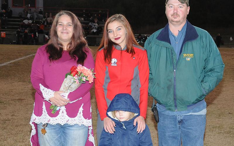 Senior band member Melody Davis, (back center) is shown with Julie Robinson, left, Timothy Davis, right, and Skylar Davis, front center.