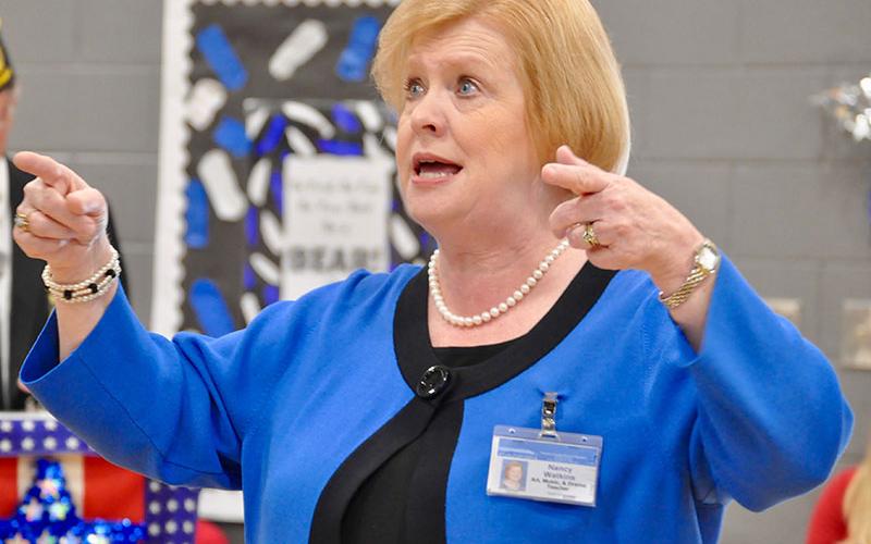 Blue Ridge Elementary School Art, Music &amp; Drama teacher Nancy Watkins conducted  “God Bless the USA” at the school’s Veterans Day Ceremony.