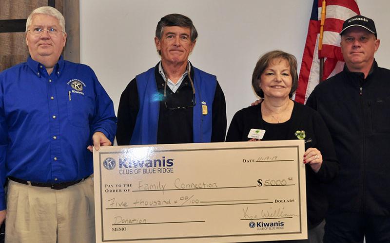 The Kiwanis Club of Blue Ridge presented Fannin County Family Connection with a check for $5,000 during the ribbon cutting of Family Connection’s new facility. Shown are, from left, Ken Williams, President Larry Ray, Executive Director Sherry Morris and Ken Brennamen.