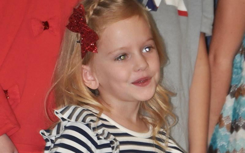 Paisley Patton danced as she sang along with her classmates at East Fannin Elementary School’s veterans program.