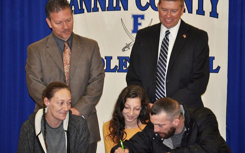 Fannin County Middle School student Chelsey Thomas’ parents agreed to support her as a REACH scholar during the signing ceremony. Shown are, from left, front, Beth Thomas, Chelsey Thomas and Phillip Thomas; back, Fannin County High School Principal Erik Cioffi and Superintendent Dr. Michael Gwatney.