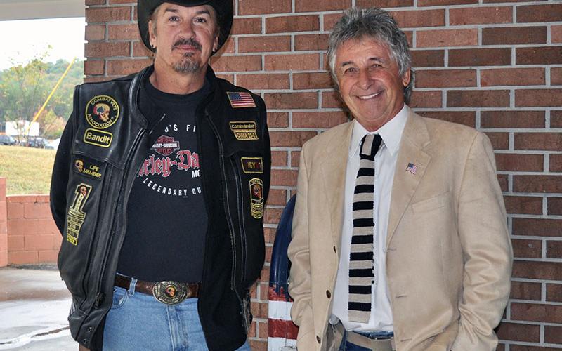 Combat Veterans Motorcycle Association North Georgia chapter members Rob Denison, left, and Bob Renneke were instrumental in getting veteran organization motorcycle riders to escort the Vietnam Traveling Memorial Wall when it arrived in Blue Ridge Thursday, October 3.