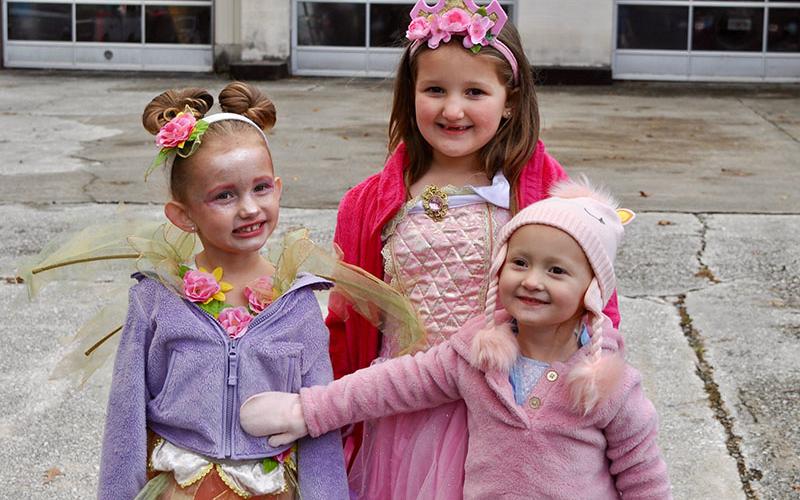 Costumed kiddos descended on downtown Blue Ridge for the safe zone event. Shown are, from left, Lexi, Sarah and Raylin.