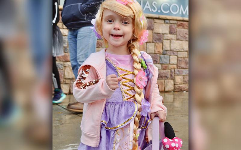 Rapunzel, also known as Scarlett Clark, was all smiles as she trick-or-treated for candy in Blue Ridge.