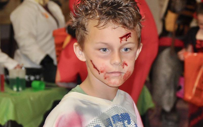 Undead Fannin County Rebel, Colton Dills, participates in West Fannin Elementary School’s trick-or-treating event.
