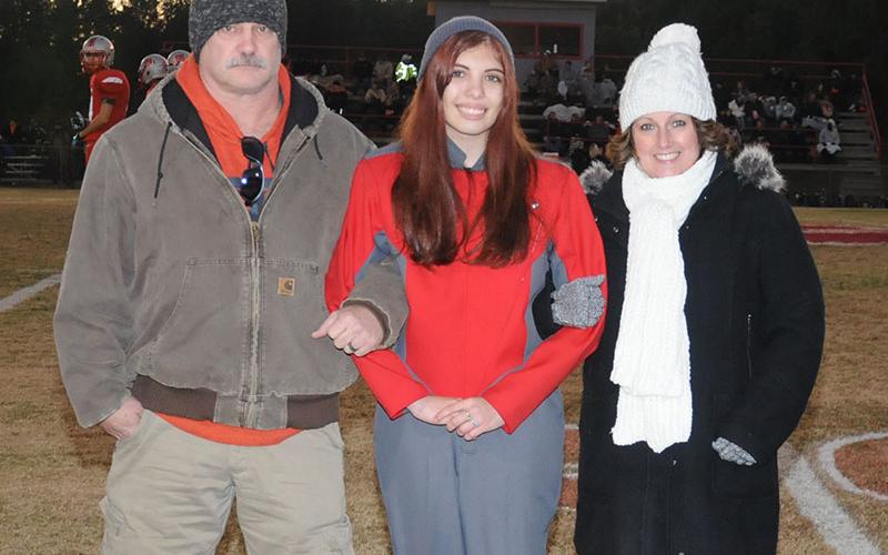 Senior band member Tiara Mitchell is shown with Brian and Jackie Mitchell at Copper Basin’s senior night Friday, November 1.
