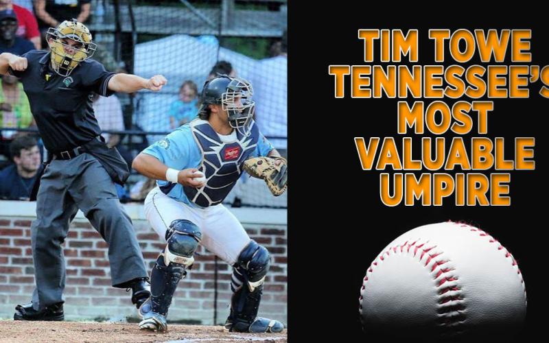 Umpire Tim Towe signals a strike 3 mechanic, meaning the batter has just struck out, during a game in Hampton, Virginia.