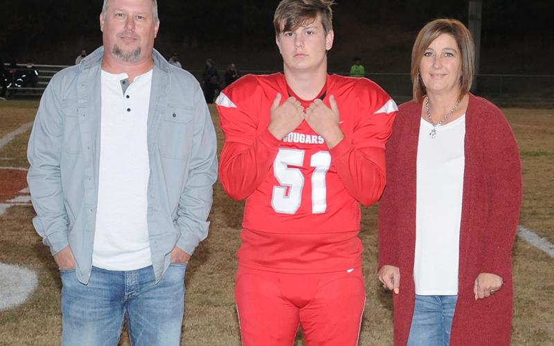 Tyler Adams was one of 19 seniors to be recognized at the Copper Basin’s senior night. Adams is shown with his parents Chris and Jessica Adams.
