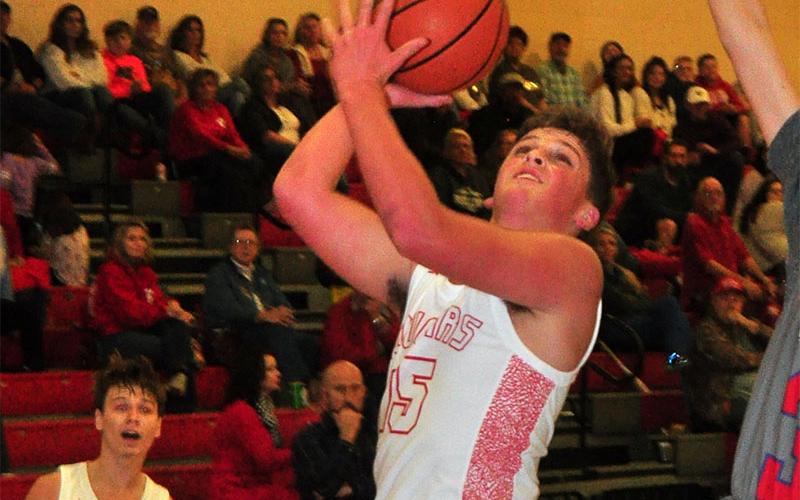 Copper Basin Cougar Tim Jabaley goes up for a contested layup during the Cougars game against the Chattanooga Patriots Thursday, December 12.