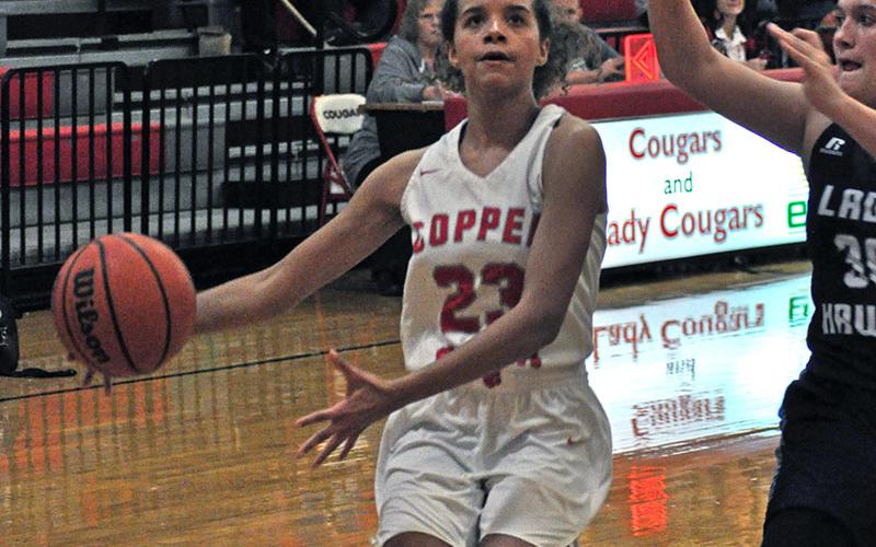 Senior Lady Cougar Hailey Brackett goes up for a score in recent action for Copper Basin.