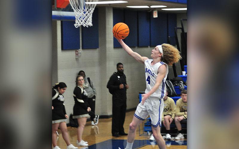 Fannin Rebel Cohutta Hyde goes up uncontested during a fastbreak in recent action for the Fannin County Rebels basketball team.