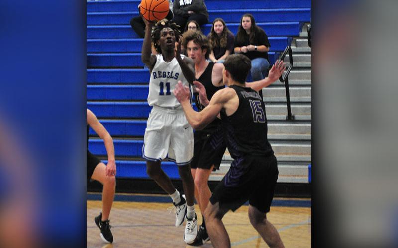 Fannin Rebel Andre Bivens shoots a jumper in the Rebels 53-51 victory over the Union County Panthers Saturday, December 7