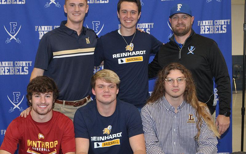 Five Fannin County Rebel baseball players signed scholarships to further their academic and athletic careers at four schools Friday, December 13. Shown following the signing ceremony are, from left, front, Carson Beavers, Blake Rogers, Hunter Gray; back, Matthew Shirah, Gabe Buchanan and Rebels baseball head coach Travis Stone.