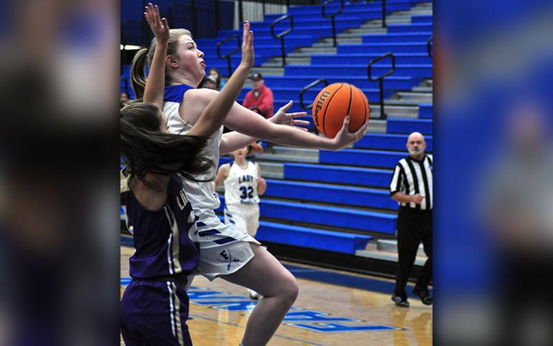 Lady Rebel Morgan Holt goes up for a contested layup during Fannin’s region win over Lumpkin Count Tuesday, December 10.