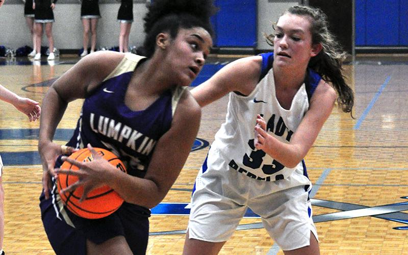 Lady Rebel Reagan York clamps down on a ball handler in recent action for Fannin County.