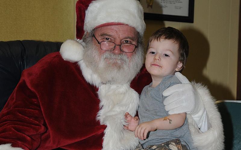 Teagan Jeans was all smiles when he finished telling Santa Claus his Christmas wishes when Santa made a special stop at the Copper Basin Community Center.