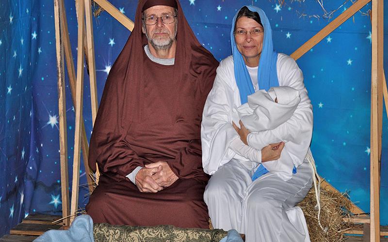 Joseph and Mary, aka Rick and and Starr Callihan, hold baby Jesus in the stable. This scene and others from the story of Jesus could be seen by driving through Mt. Moriah Baptist Church’s Live Drive Through Nativity, The Road to Bethlehem December 6 and 7.
