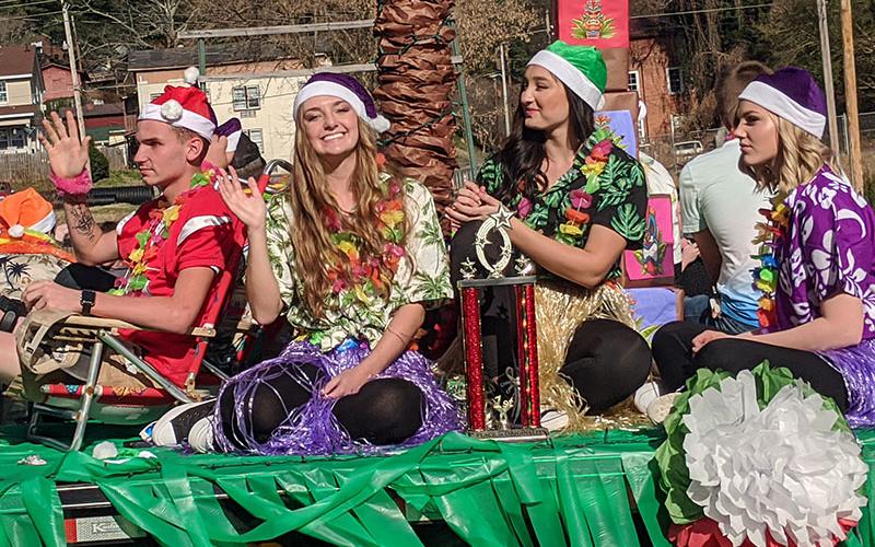 These students created a Hawaiian Christmas float for the Christmas Around the World themed Copperhill Kiwanis Christmas Parade.