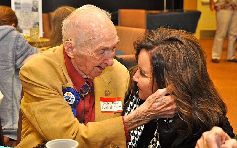 Fannin County celebrity Dale Dyer affectionaly greets his friend and City of Blue Ridge Mayor Donna Whitener during his birthday party held at the First Baptist Church of Blue Ridge’s Youth building, November 30. December 8, Dyer’s actual birthday, has been proclaimed as Dale Dyer Day, in honor of his 100 years and his contributions to the county.