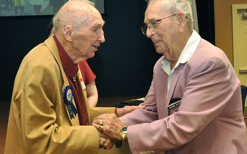 Fannin County celebrity Dale Dyer shakes hands with Lieutenant Colonel George D. Pletcher at his 100th birthday party, November 30. Dyer officially turns 100-years-old December 8, which has been proclaimed by the City of Blue Ridge as Dale Dyer Day.