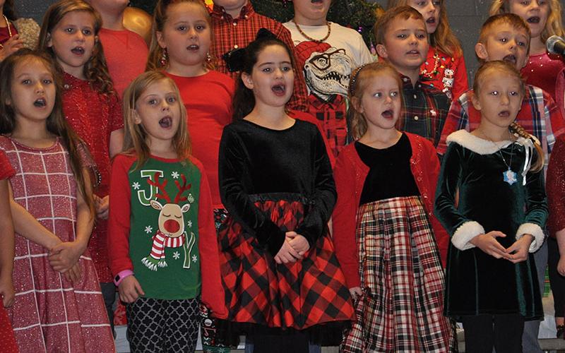 Copper Basin Elementary School first graders belt out the timeless “Silent Night.” Shown are, from left, front row, Meadow Barnes, Kylie Boring, Aisley Walker, Cassandra Sinard and Elyanna Vasquez; middle, Peyton Pack, Temperance Hughes, Weston Cearley and Keanan Roberson; back, Raylan Boring, Ethan Nelson, Giovanni Mazzerella, Sonja Johnson and Chloe Allen.