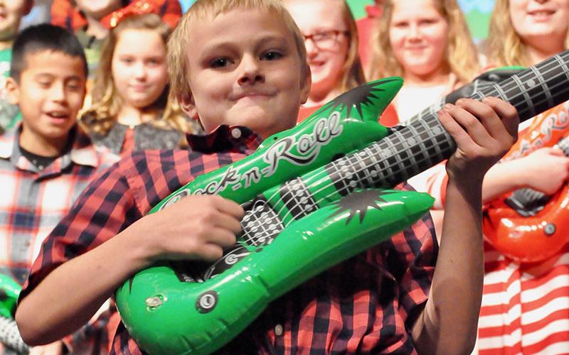 Blue Ridge Elementary School student Cash Ades rocked out on his guitar during the school’s White Christmas program.